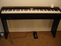 Kawai CL25, zwart gesatineerd, digitaal Kawai CL25, zwart gesatineerd, digitaal